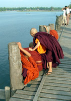 Buddhist monks on U Bein's Bridge, Amarapura, Myanmar
