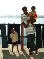 Proud father and sons by the Ganges, Varanasi
