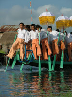 Men rowing with their legs, Lake Inle, Myanmar - formerly Burma