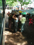Vendors at a bus stop, Myanmar